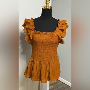 #12) Nanette Lepore Ruffled Rust blouse